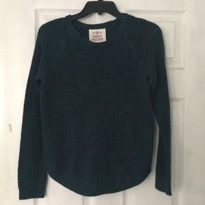 Green and blue sweater